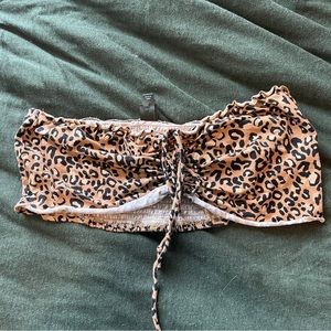 Cheetah/leopard print strapless crop top.
